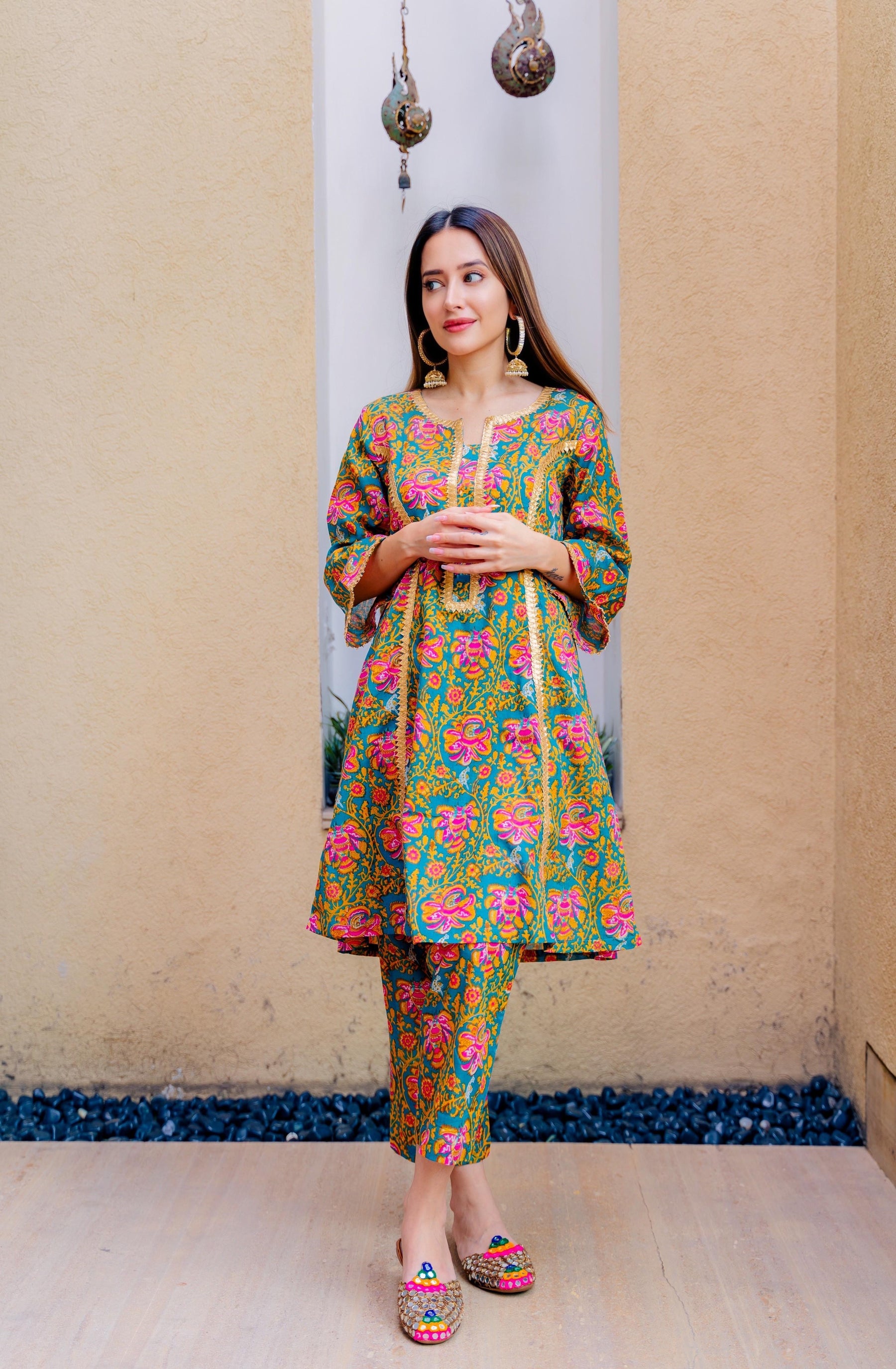 Sara Ali Khan wears her floral kurta with checkered pants in Mumbai | VOGUE  India